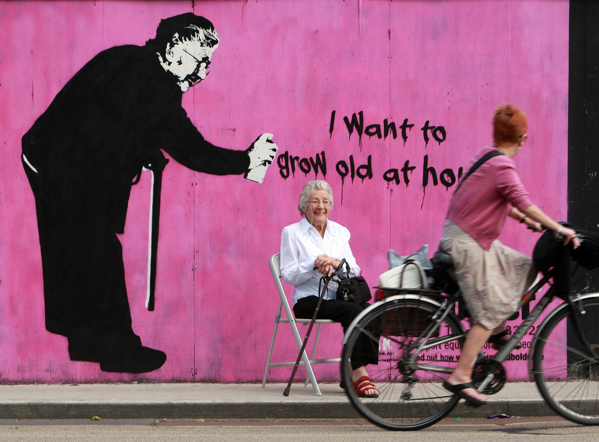Image of 90 year old Mabel Gargan in front of Street Art piece created by Fink. Conor Healy Photography